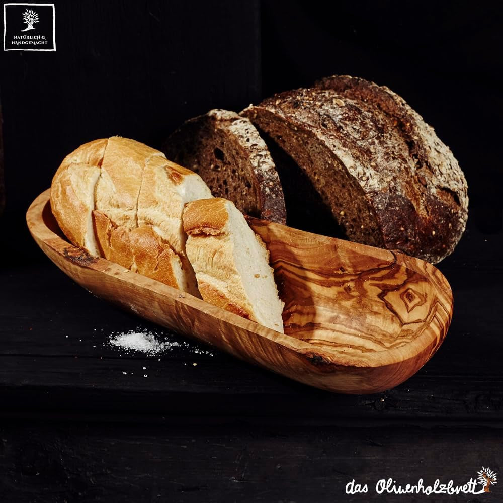 Das Olivenholzbrett® / Typisch Schmal Geschnittene Baguetteschale Olivenholz/Brotschale Aus Holz, Naturbelassener Rand, 25 Cm